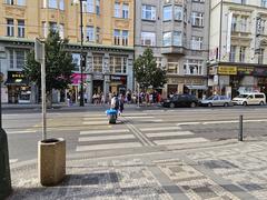 Street view of Národní třída with pedestrians and city buildings