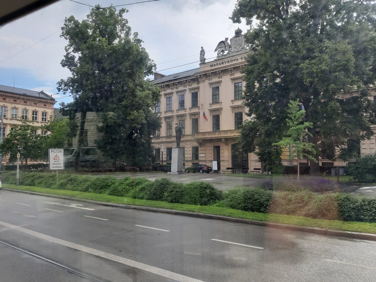 Statue of Tomáš Garrigue Masaryk with a face mask in front of Masaryk University during COVID-19 pandemic