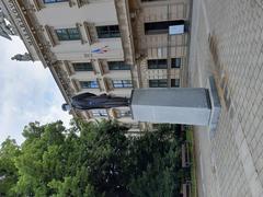 Statue of T.G. Masaryk in front of Masaryk University wearing a face mask during COVID-19 pandemic