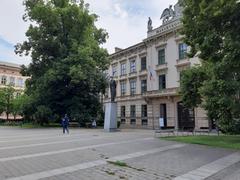 Statue of Tomáš Garrigue Masaryk with a face mask in front of Masaryk University during COVID-19 pandemic