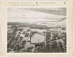 Flooded street in Cincinnati, Ohio during a heavy flood event with submerged vehicles and buildings