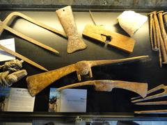Exterior view of Limonaia del Castel with antique farming tools in Limone sul Garda, Lake Garda, Brescia, Italy