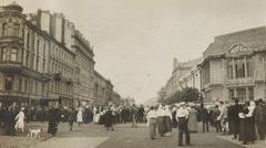 Historic parade on Nevsky Prospect in Petrograd near the Hermitage Art Gallery with the Neva River and Winter Palace in background