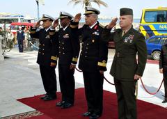 U.S. and Egyptian naval officers salute during wreath laying ceremony at Unknown Soldier Monument in Alexandria, Egypt
