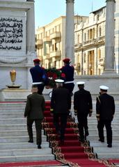 US Navy officers and Egyptian naval officers render salutes at wreath laying ceremony at Unknown Soldier Monument Alexandria Egypt