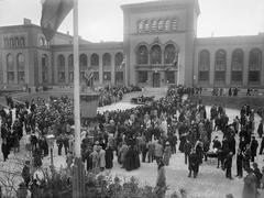 100th anniversary celebration of Bergens Museum with people gathered in front of the building on April 25, 1925