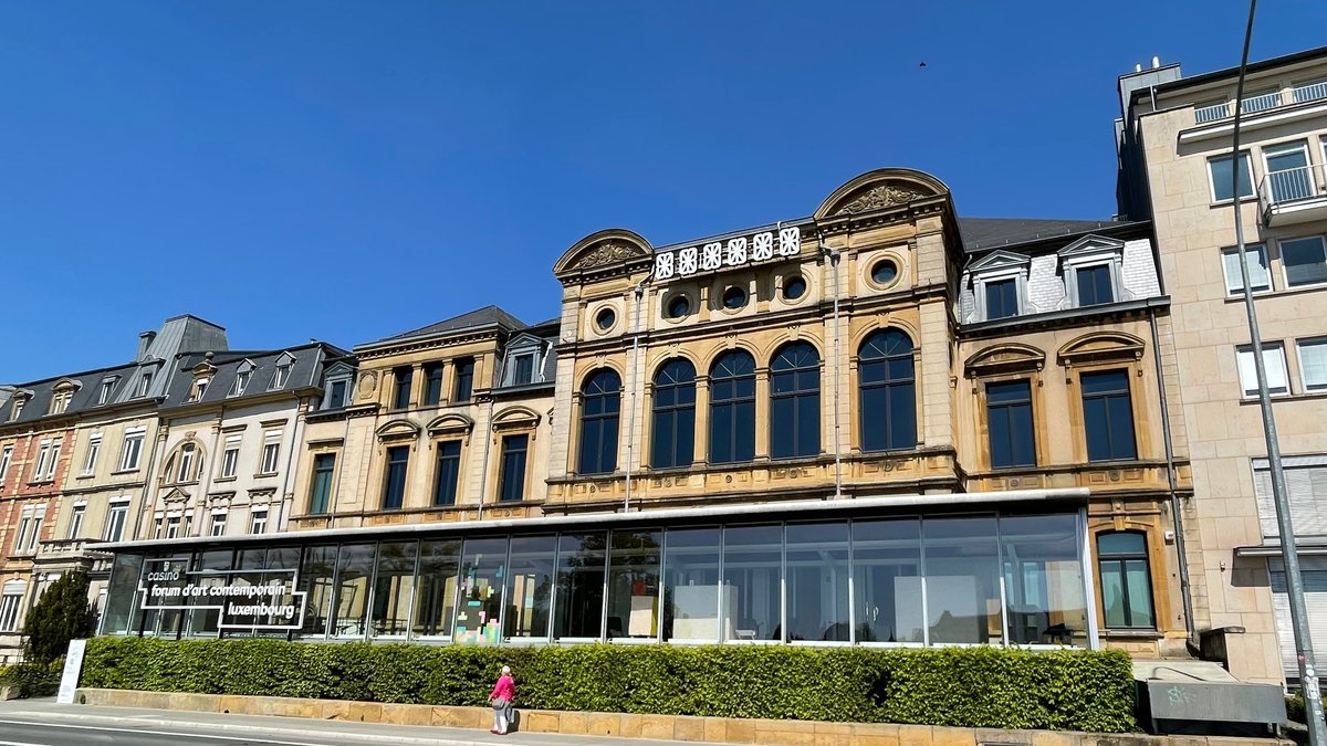 Interior view of Casino Luxembourg - Forum d'Art Contemporain with modern architecture and visitors