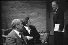 President Gerald Ford, David Mathews, and former Michigan Governor George Romney meeting at the Fourth Presidential Library Conference in 1986