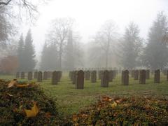 Mainz Hauptfriedhof cemetery in autumn with trees and headstones