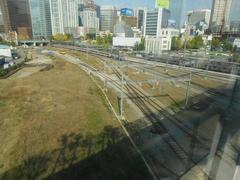 View of Seoul Station and surrounding buildings from Seoullo 7017 elevated skypark with tree shades
