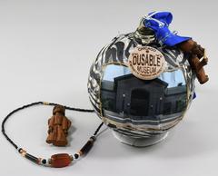 2009 White House Holiday Ornament featuring the Dusable Museum of African American History with zebra print, wood figures, and beaded necklace