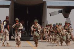 Iraqi soldiers disembarking from an Iraqi Air Force plane at Baghdad International Airport during Operation Fardth - Al Kanoon in 2007