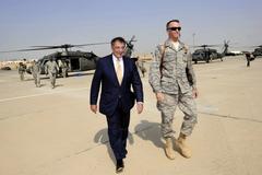 U.S. Defense Secretary Leon E. Panetta and Brig. Gen. Anthony J. Rock at Baghdad International Airport