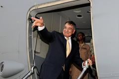 U.S. Defense Secretary Leon E. Panetta waving farewell at Baghdad International Airport on July 12, 2011