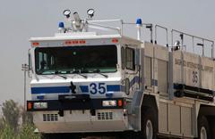 New fire truck at Baghdad International Airport demonstrating capabilities