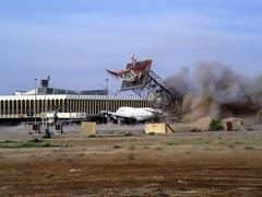 Demolished obsolete radar tower and deserted Iraqi Airways 747 at Baghdad International Airport