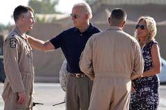 Vice President Joe Biden and Dr. Jill Biden visiting airmen on flightline at Baghdad International Airport in 2010