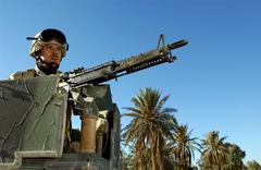 United States Air Force Sergeant on guard duty at Baghdad International Airport in 2003