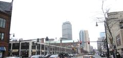 Street view of Huntington Avenue and Gainsborough Street in Boston, Massachusetts with historic buildings and city traffic