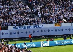 Whitecaps FC supporters celebrating victory at Empire Field