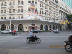 Hotel Majestic decorated with Christmas lights and holiday decorations at night