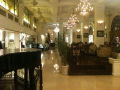 Luxurious lobby of Majestic Hotel Saigon with elegant decoration and seating