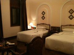 Deluxe hotel room at Majestic Hotel Saigon Riverside with elegant interior
