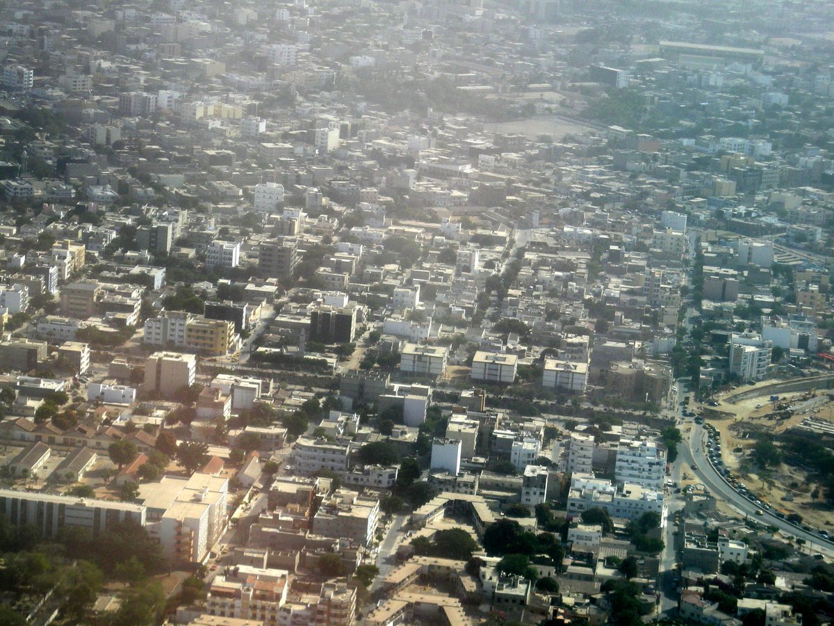 Aerial view of Dakar cityscape with coastline and buildings in Senegal