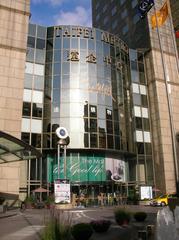 Far Eastern Plaza The Mall modern high-rise buildings with glass windows under a blue sky