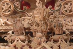 Detailed view of wooden miniature artwork depicting crowns, created for the 1916 throne accession of Emperor Karl I of Hungary