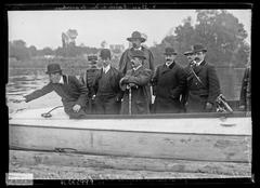 Group portrait of early aviation pioneers Louis Blériot, Ferdinand Ferber, Léon Delagrange, Samuel Franklin Cody, Archduke Leopold Salvator of Habsbourg-Toscane, Jaime de Borbón, and Henry Kapferer in 1907 by the Seine River