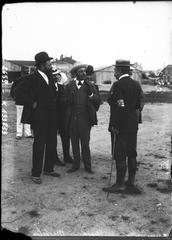 Historic black and white photograph of aviation pioneers Ferdinand Ferber, Ernest Archdeacon, and Édouard Michelin circa 1908