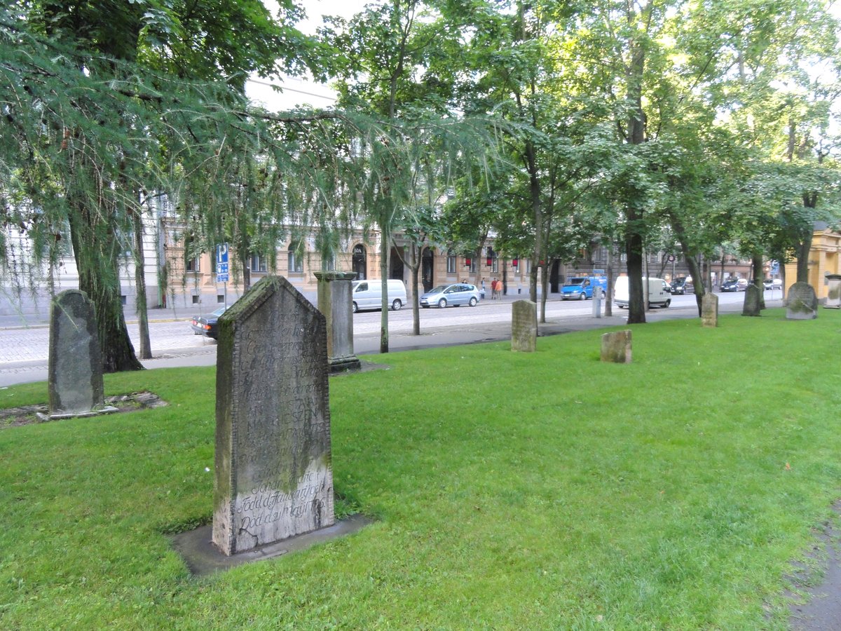 Old Church Park with green lawn and trees in Helsinki Finland