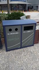 Sorted waste bins for recycling bottles and cans and trash disposal at the Florida Aquarium