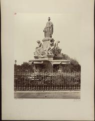 Historic railway monument in Nîmes, Gard, France depicting a classical fountain with statues