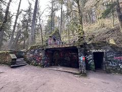 Witch's Castle abandoned stone building surrounded by forest in Forest Park Portland Oregon