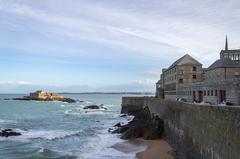 Ramparts of the Saint-Malo walled city with Fort National in the distance