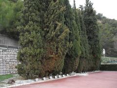 General view of the gravel terrace at the Fusillés de l'Ariane square in Nice with name plaques of the executed