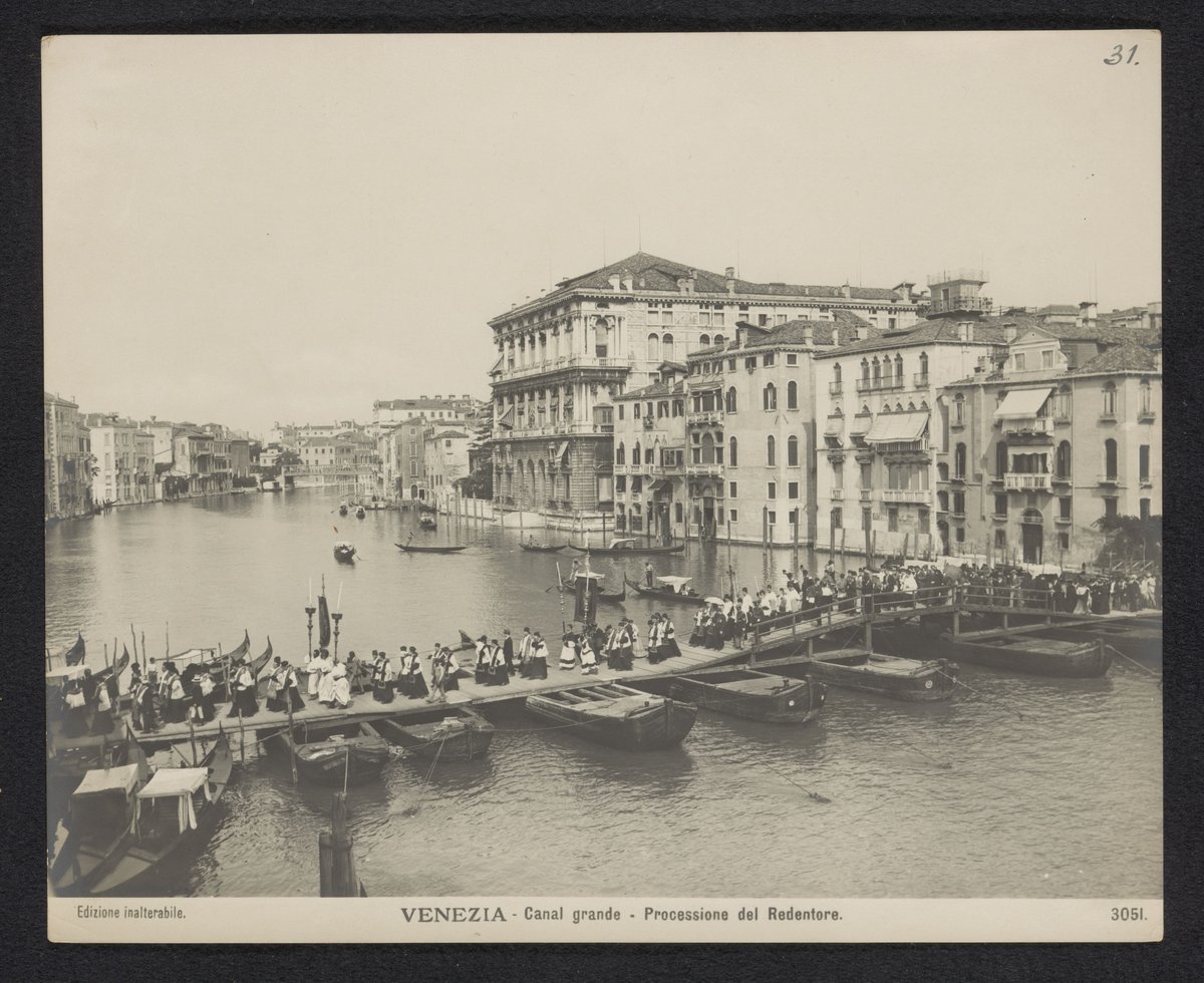 Procession crossing pontoon bridge on Canal Grande in Venice during Festa del Redentore around 1900