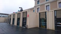 Left side facade of Angoulême train station with Lucien comic character mural