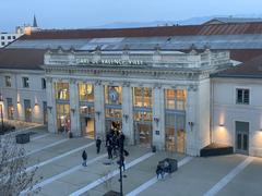Valence-Ville train station at night with illuminated platform and empty tracks in January 2021