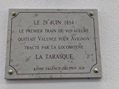 Commemorative plaque at Valence-Ville railway station honoring the first passenger train to Avignon on June 29, 1854