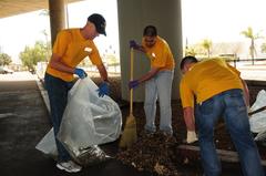 U.S. Navy sailors cleaning Old Town Transit Station in San Diego during CPO 365 volunteer event