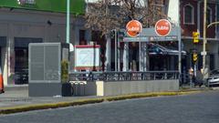 Entrance to De Los Incas metro station in Buenos Aires with surrounding urban buildings