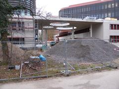 Construction site at Karlsruhe Institute of Technology with cranes and building framework
