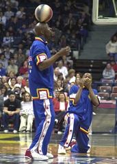 John Lane flamboyant rookie point guard for Harlem Globetrotters spins basketball on head at San Diego Sports Arena