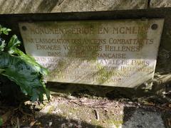 Historic monument at Père-Lachaise Cemetery with inscription MCMXII