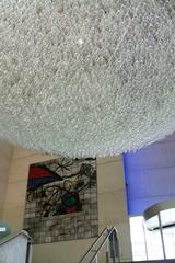 Ceramic mural artwork by Joan Miró and Josep Llorens Artigas, alongside 'Un Pedazo de Cielo Cristalizado' by Javier Pérez in the lobby of ARTIUM Museum, Vitoria-Gasteiz