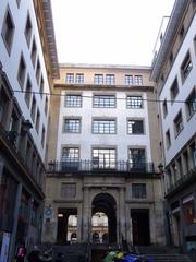 Street view of Calle de Mitxel Labegerie in Bilbao with autumn trees and buildings