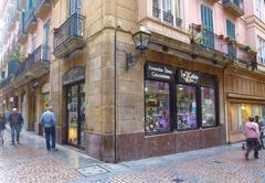 Facade of Tienda Las 7 Calles in Bilbao with colorful signage and window displays